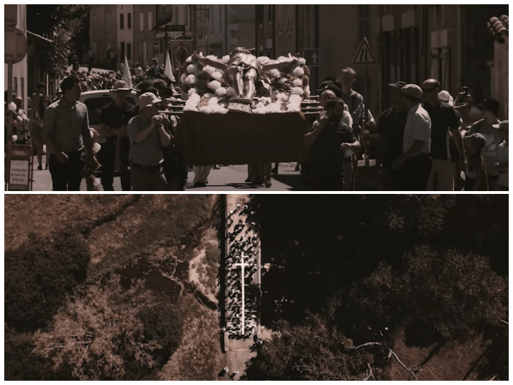 Des membres de SOS Calvaires organisent une procession. Ils portent une croix de bois haute comme un immeuble de cinq étages